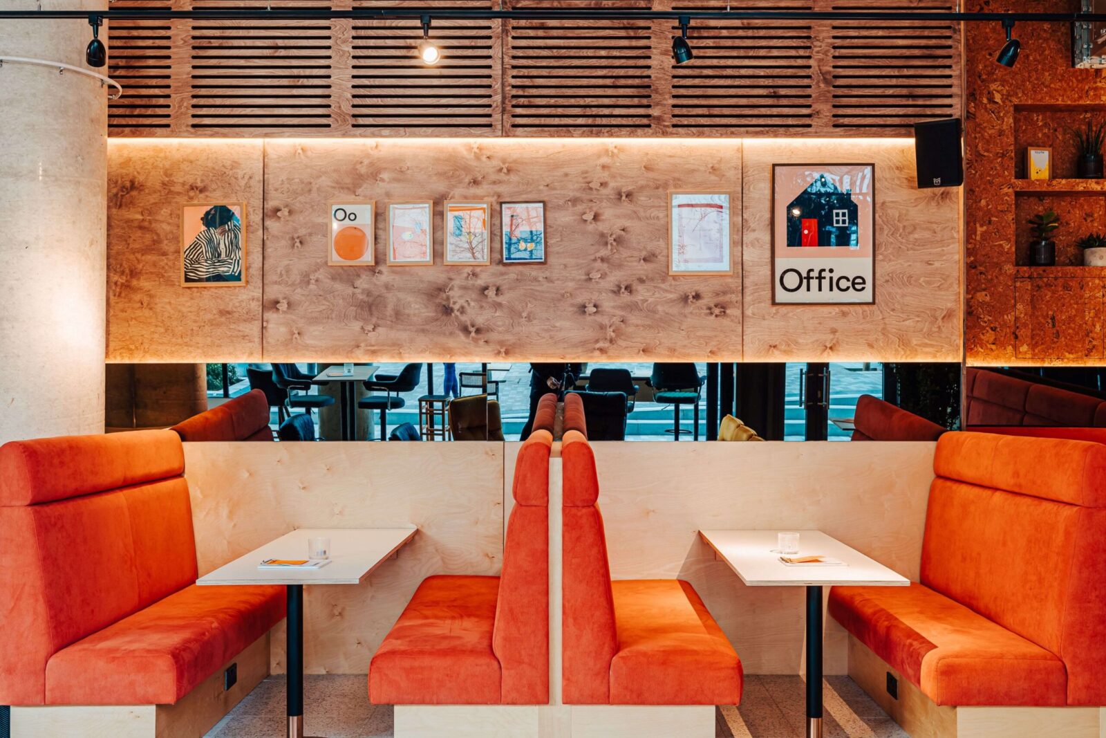 Orange booth tables for hot desking at Someday, Finsbury Park