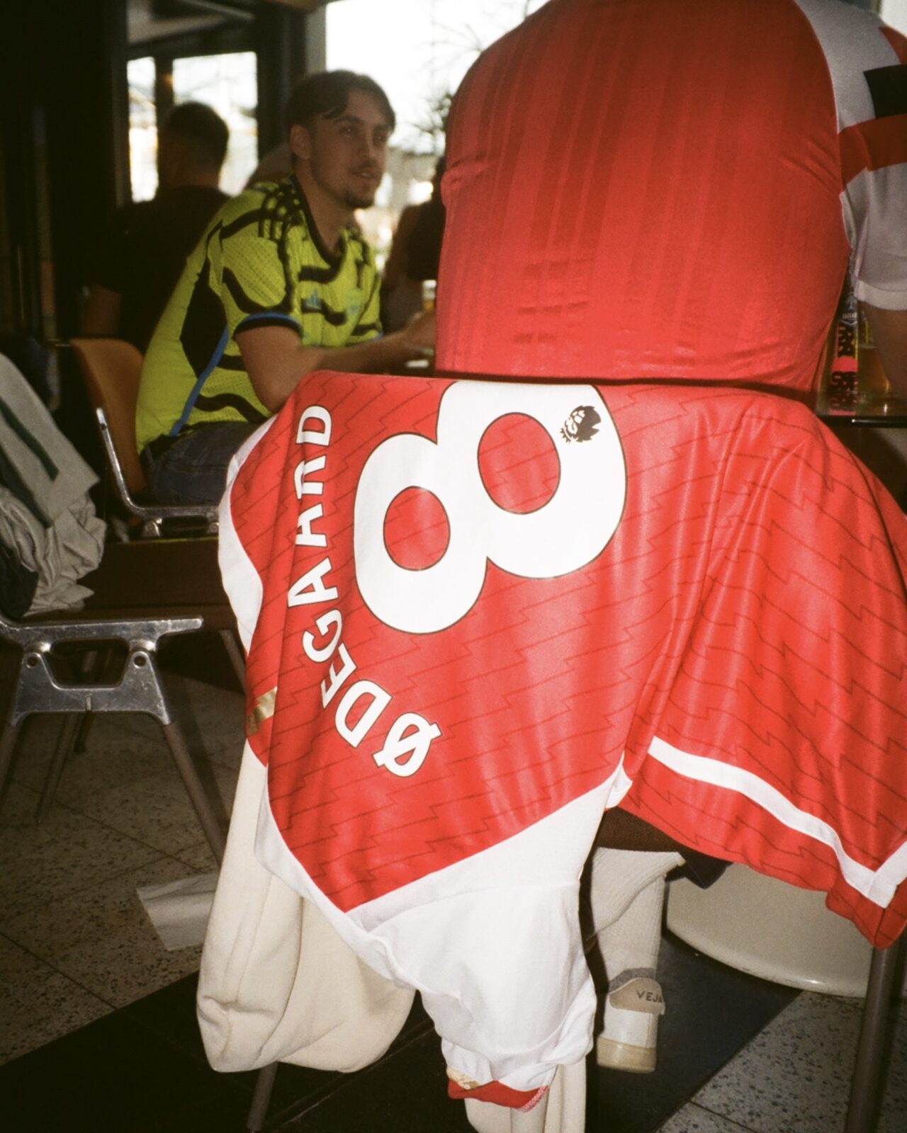 Arsenal fan in an Odegaard 8 shirt at Someday on a matchday