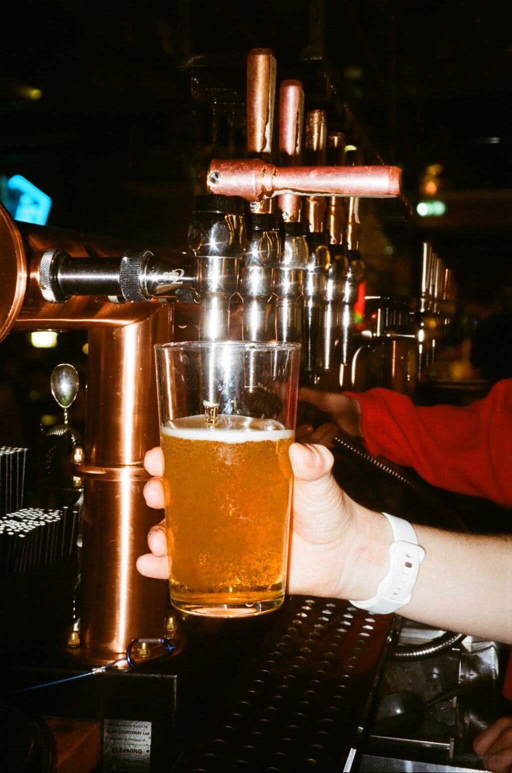 Photo of a pint of beer being poured from the draught tap.